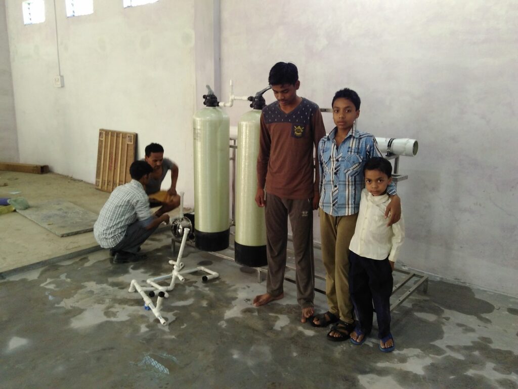 My cousin with filter plant village startup year 2016 AskDushyant