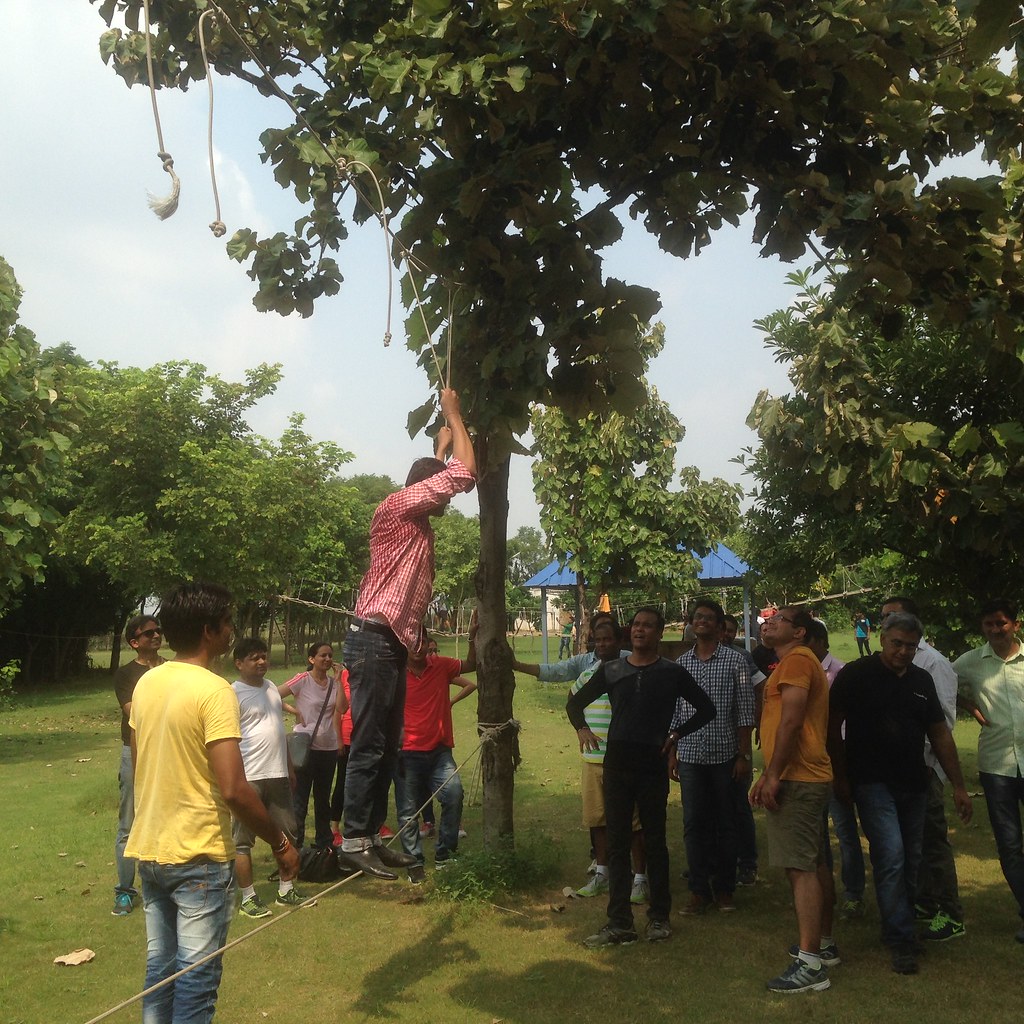 Team enjoying rope balancing Peoplestrong tech team outing Yr 2016 AskDushyant