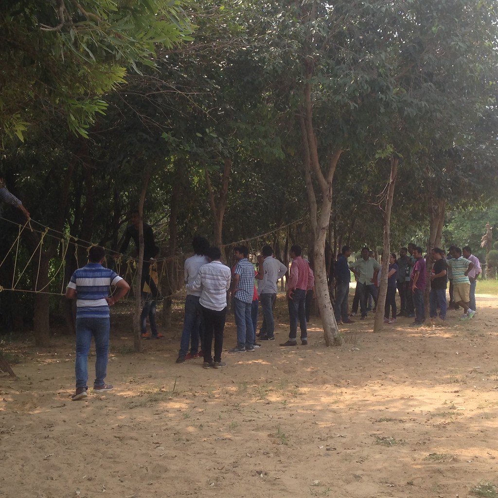 Team enjoying rope crossing Peoplestrong tech team outing Yr 2016 AskDushyant